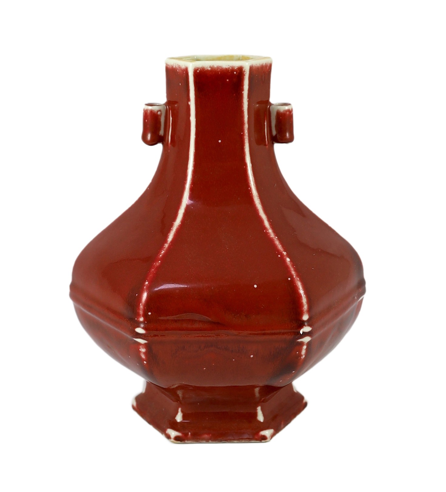 A Chinese copper red glazed hexagonal hu vase, late 19th/early 20th century, 28cm high